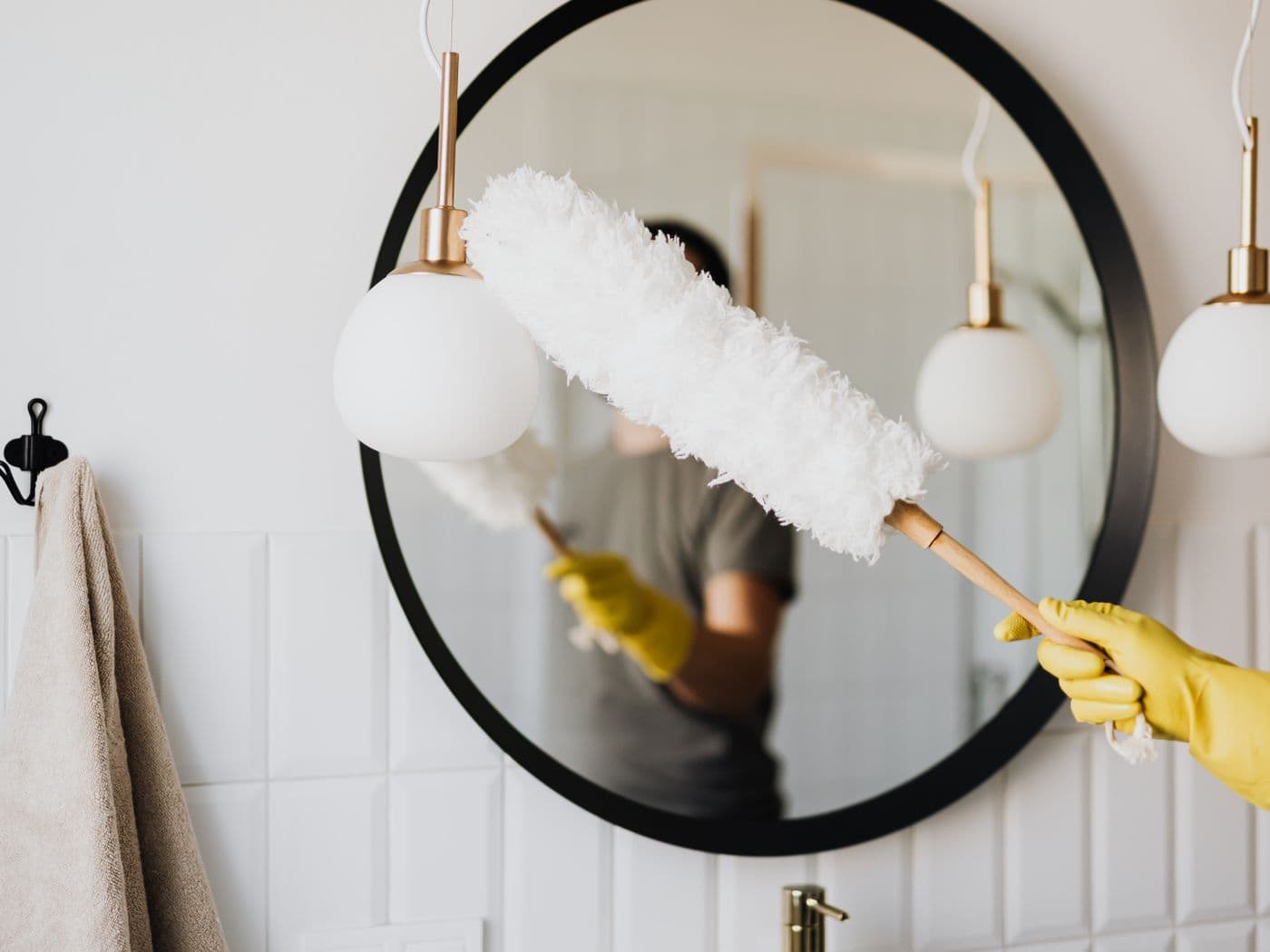 Professional cleaner preparing a modern home
